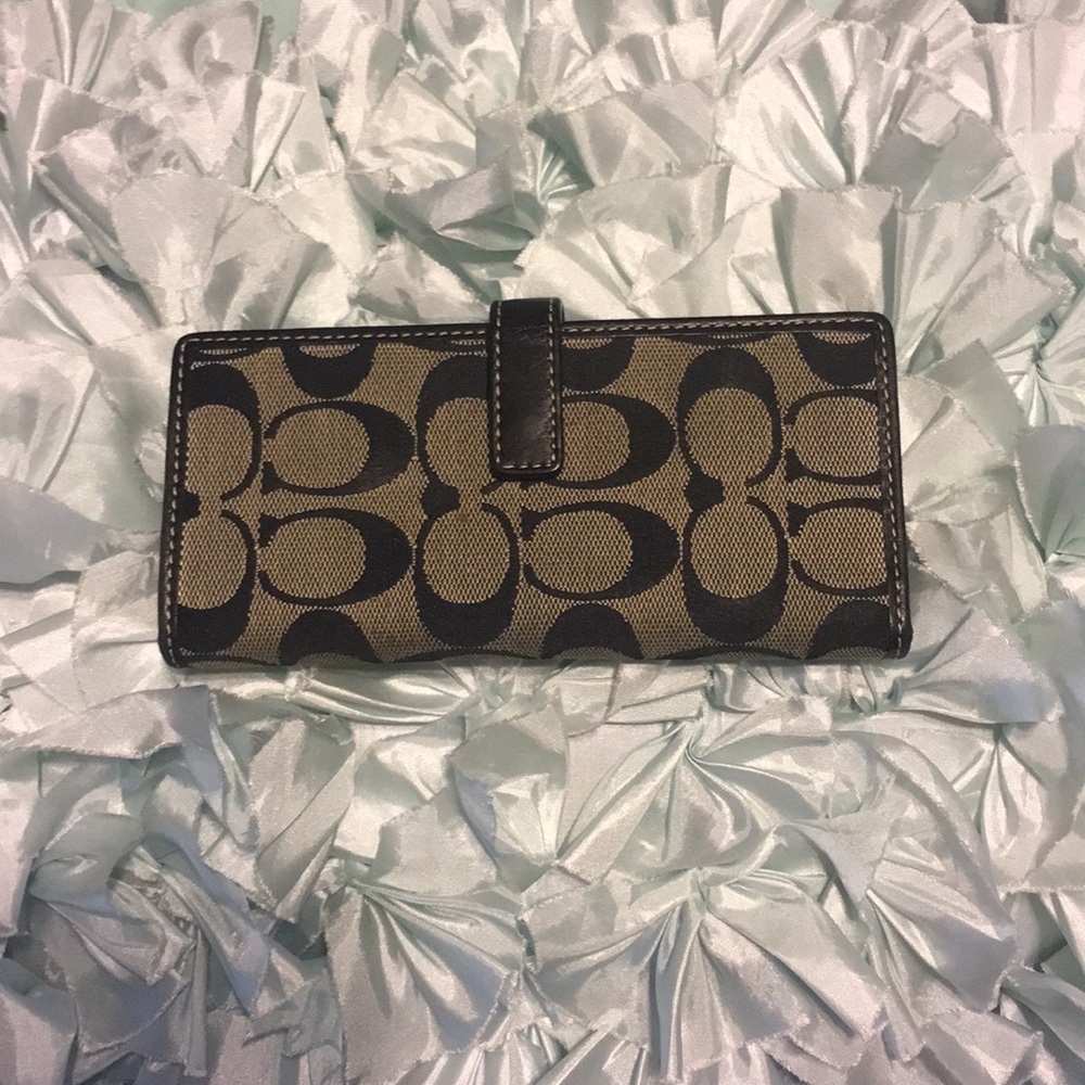 Authentic Coach checkbook wallet.